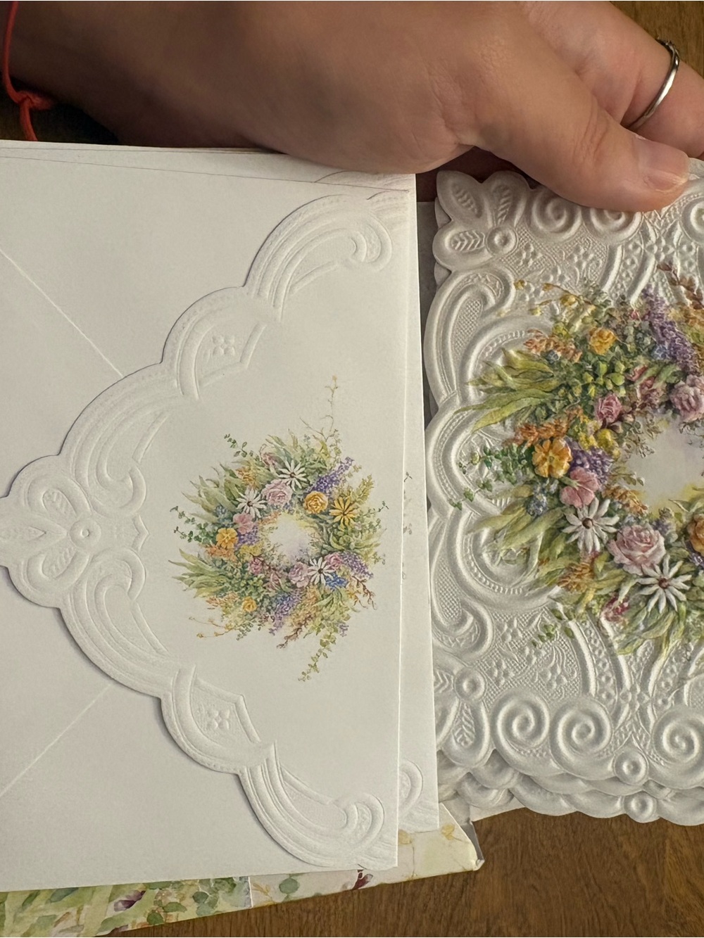 Embossed White Floral Wreath Card with Pastel Flowers